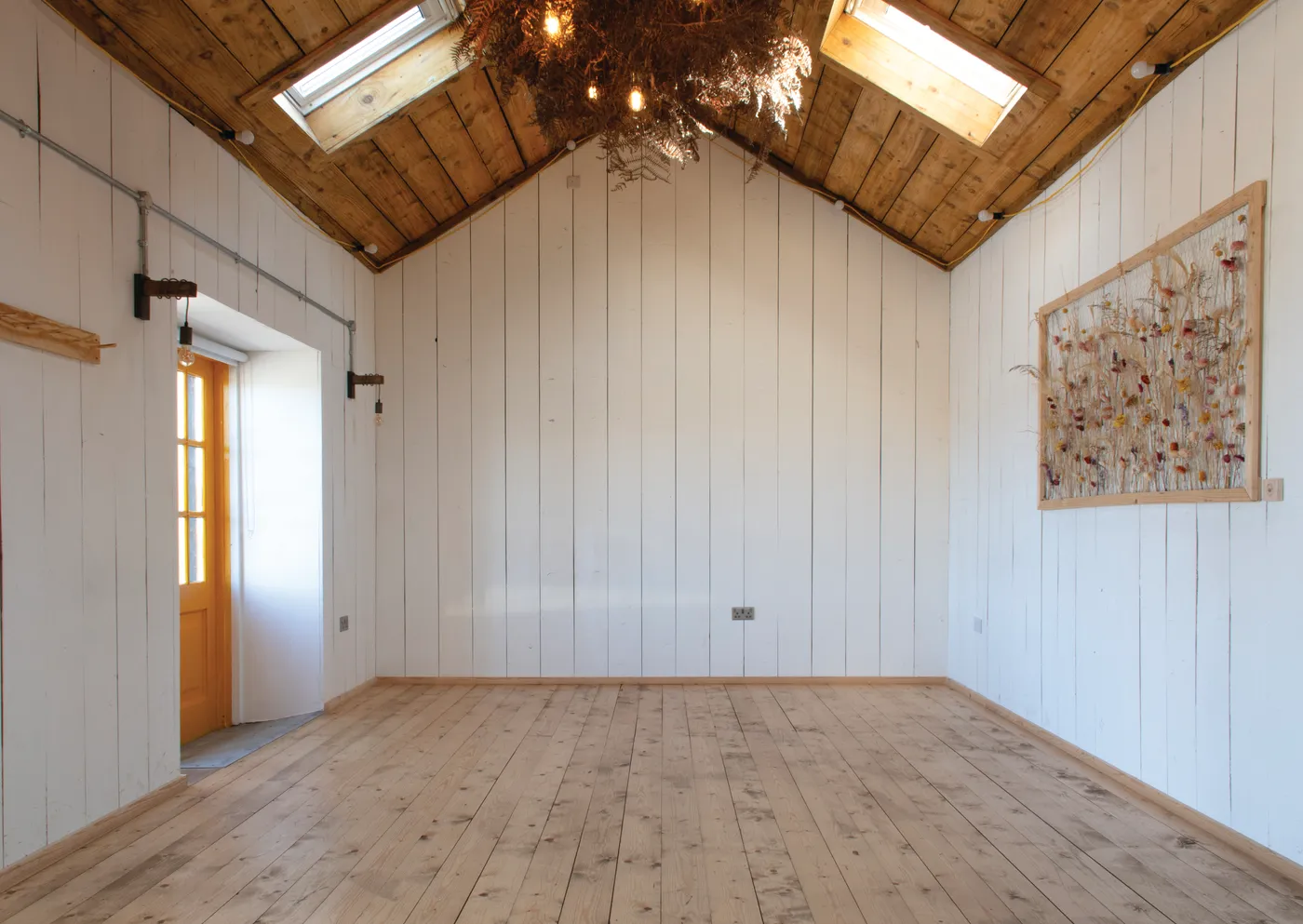 Interior of the Hatched event space at Mad Yolk Farm, a converted cattle shed