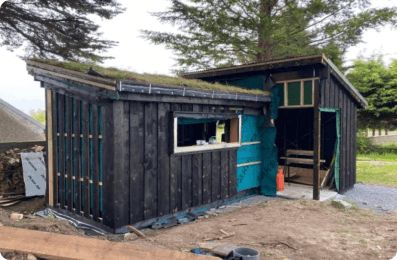Custom hand-built sauna construction at Mad Yolk Farm